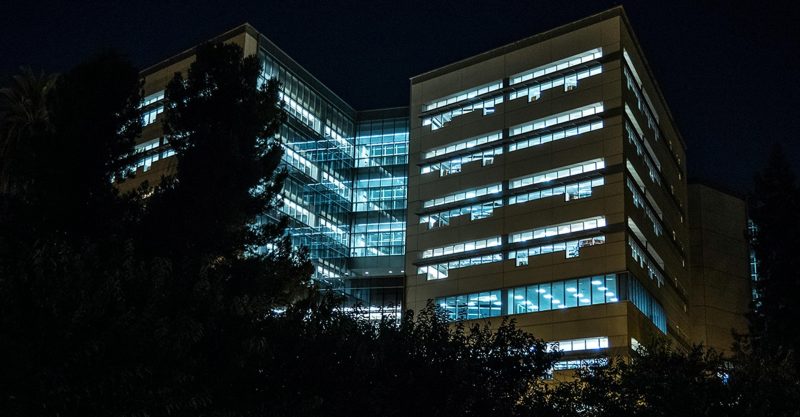 Illuminated commercial building at night - Shop C2CLights.com.